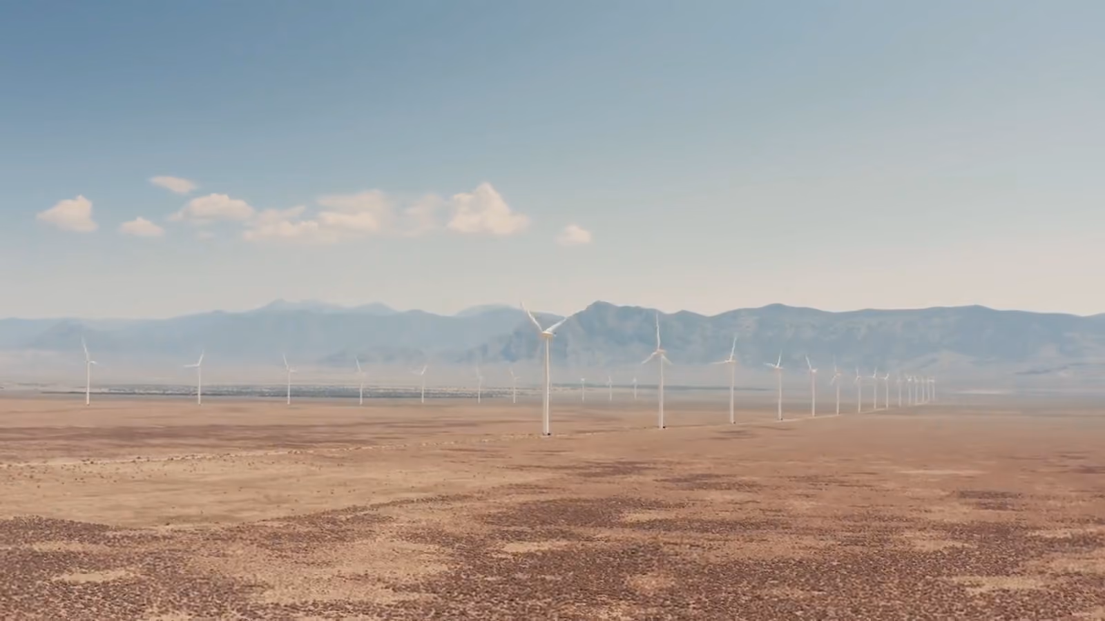Wind turbines across a desert plain